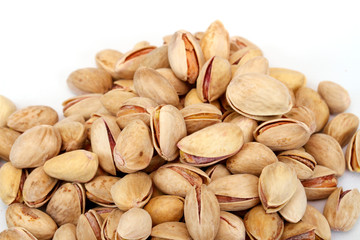 Close-up image of pistachios studio isolated on white background