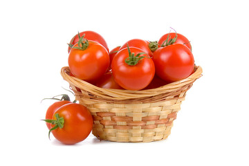 Ripe tomatoes in a wicker basket