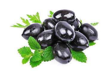 Black olives with green leaves isolated white background