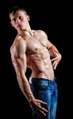 Fototapeta na wymiar Muscle sexy young man perfused with milk