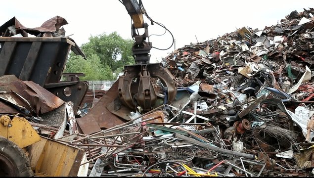Picking up metal for recycling
