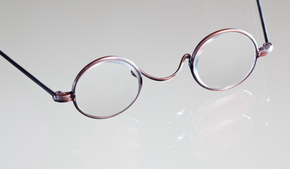 Antique reading glasses isolated