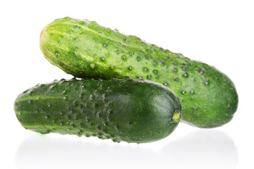 Two green cucumber isolated on white