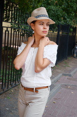 Beautiful young woman in the street