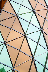 colored and mirrored windows as city background