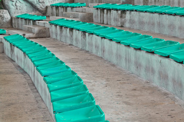 old plastic green seats on stadium
