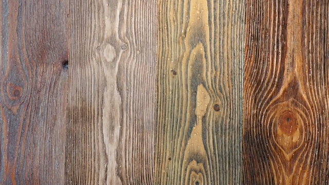 Wooden boards painted in different colors with floating water