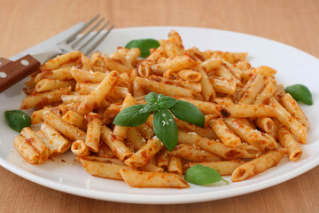 penne with sauce and basil