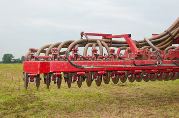 Closeup of a used manure injector (front)