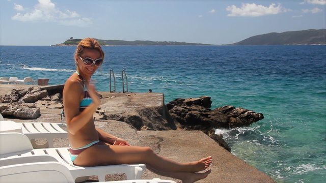 Girl enjoying on the sea