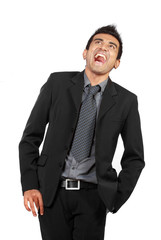 Confident businessman laughing isolated over white background