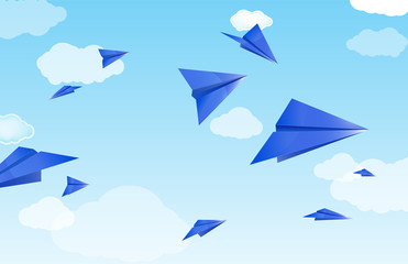 blue paper planes on sky and cloud background