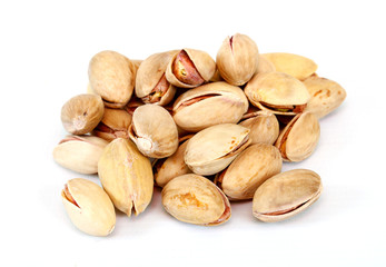 Close-up image of pistachios studio isolated on white background