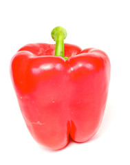 Bright red pepper isolated on white.