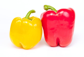 Red and yellow pepper are isolated on a white background