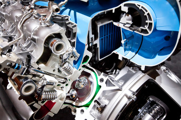 Obraz premium Grey metallic gears bucket in car motor