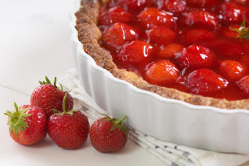 sweet strawberry pie on a white table