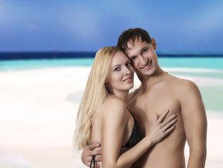 Fototapeta premium Couple in love on sea beach