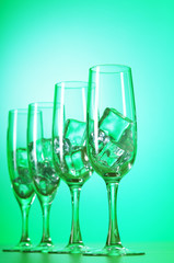 Glasses of water against gradient background