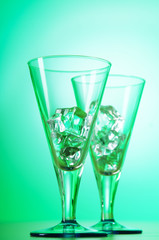 Glasses of water against gradient background