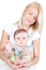 Happy mother with little pretty daughter