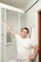 Fototapeta na wymiar Portrait of courageous man in his bathroom