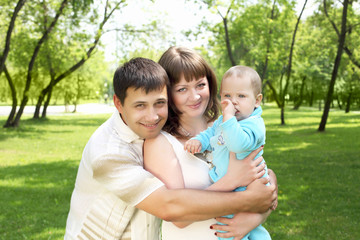 Young family together in the park