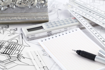 Ruler calculator, metric folding ruler, notepad, pen