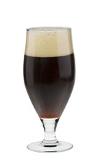 Alcohol dark beer glass with froth isolated over white.
