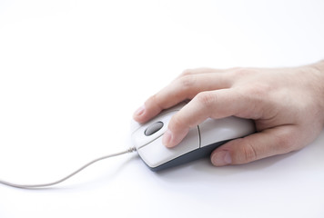 Hand with computer mouse on white background