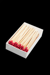 Wooden matchsticks in box