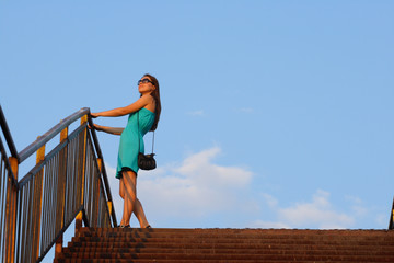attractive girl walking on staircase