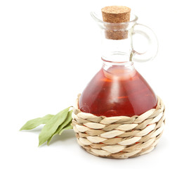 vinegar bottle and laurel leaf