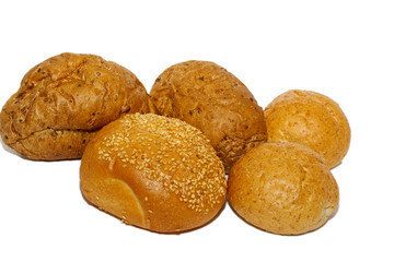 loafs of whole wheat and rye bread and isolated