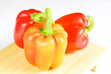 fresh and juicy vegetables on the wood plate isolated