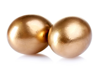Fototapeta premium golden eggs isolated on white