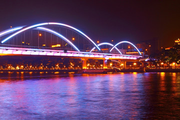 Fototapeta na wymiar Guangzhou bridge at night in China