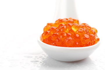 Salmon caviar in spoon