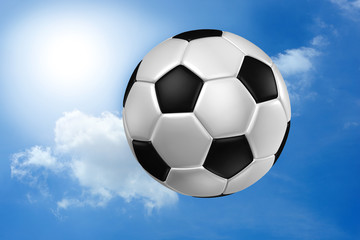 Football against blue sky