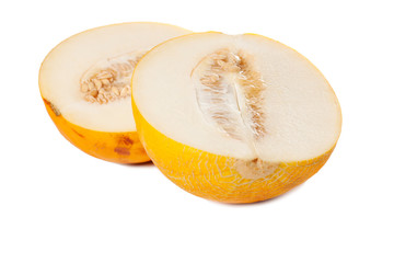 fresh galia melon halves on a white background