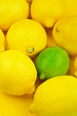 Fresh lemons and single lime.