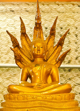 sitting buddha image with seven head naka
