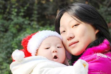 cute baby with mother