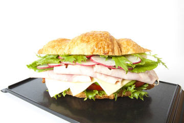 submarine, big submarine ham and cheese croissant sandwich.
