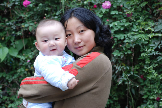 cute baby with mother