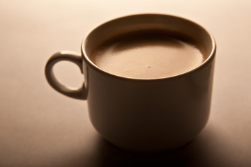 Coffee cup on table. Close up.