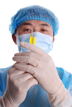 doctor using a syringe