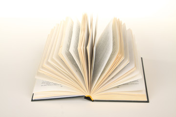 Open book on white background