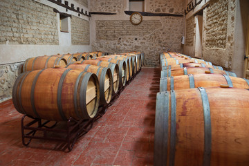 Wine barrels in an aging cellar of Ribera del Duero, Spain