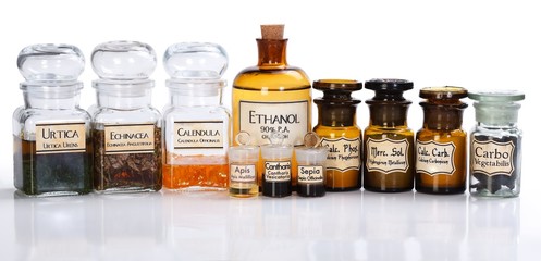 Various pharmacy bottles of homeopathic medicine - obrazy, fototapety, plakaty